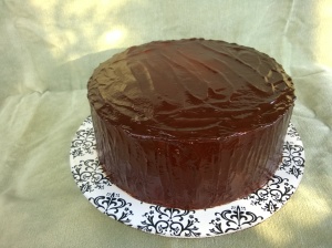 A rich, densely fudgy chocolate sour cream chocolate cake, with a simple, classic fudgy chocolate frosting.